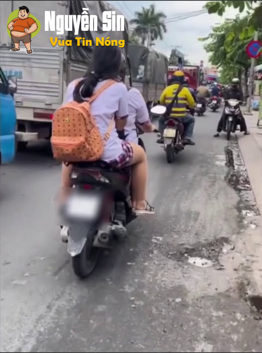 CSGT TPHCM xác minh clip nữ sinh đầu trần, phì phèo thuốc lá trên xe máy